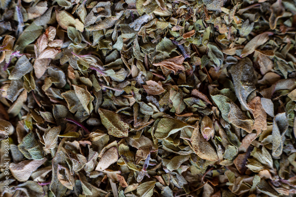 Fullscreen macro closeup of dried oregano. Food seasoning. Texture. Graphic design. Fullscreen macro closeup of dried oregano. Food seasoning. Texture. Graphic design.