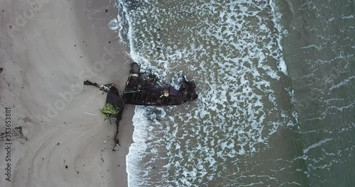 Aerial view of old ship at the beach, Barents Sea coastline , Teriberka, Kolsky District, Murmansk region, Russia photo