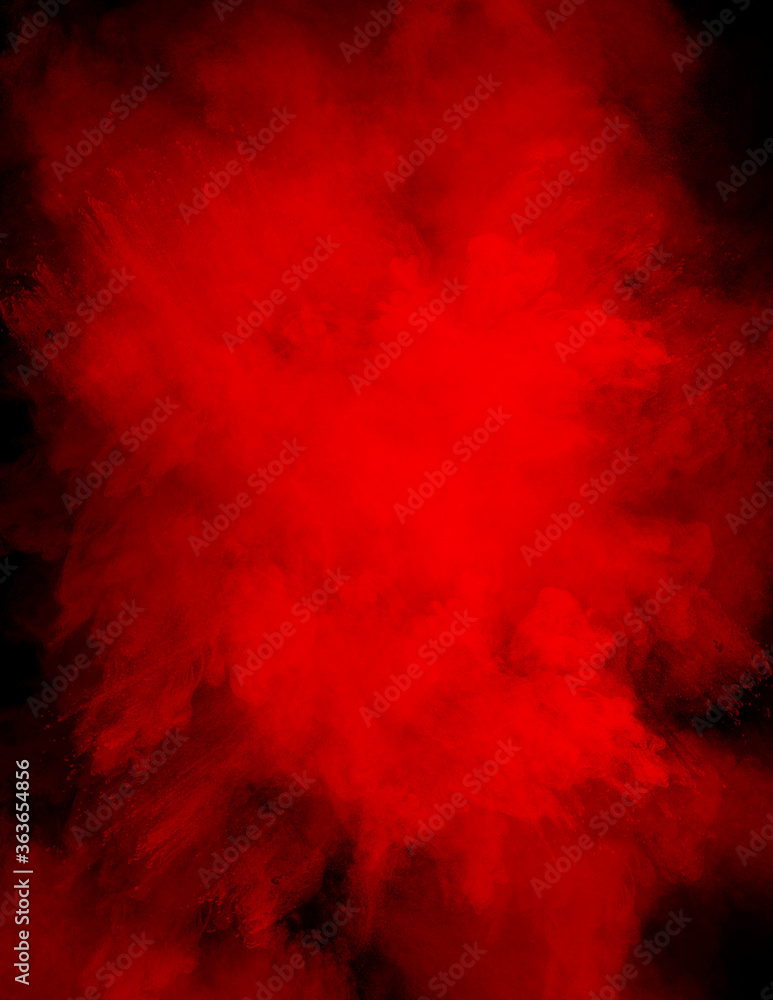 Powder explosion in a vibrant color with a black background with copy space in the powder Powder explosion in a vibrant color with a black background with copy space in the powder