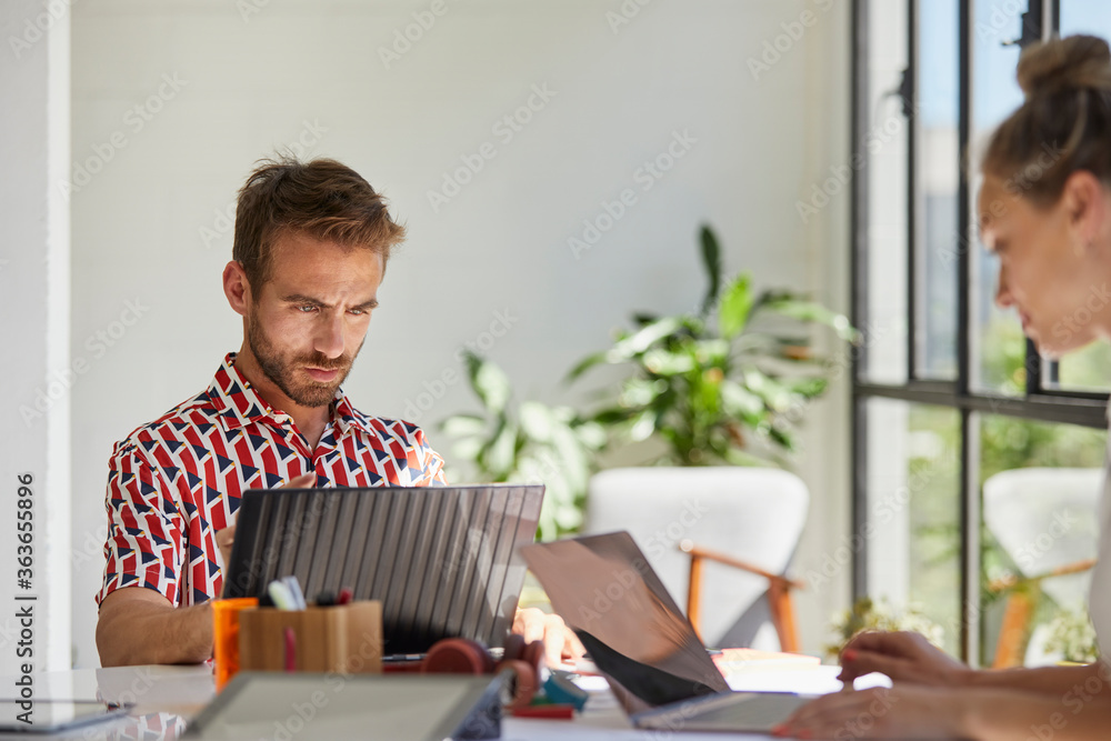 Young Businessman Working on the Computer Young Businessman Working on the Computer