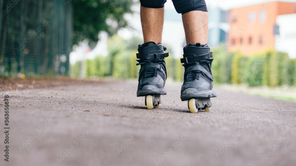 Active young man on roller skates Active young man on roller skates