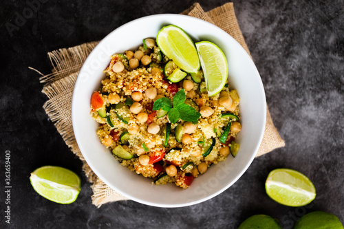 Cous cous with zucchini, lime and chickpeas photo