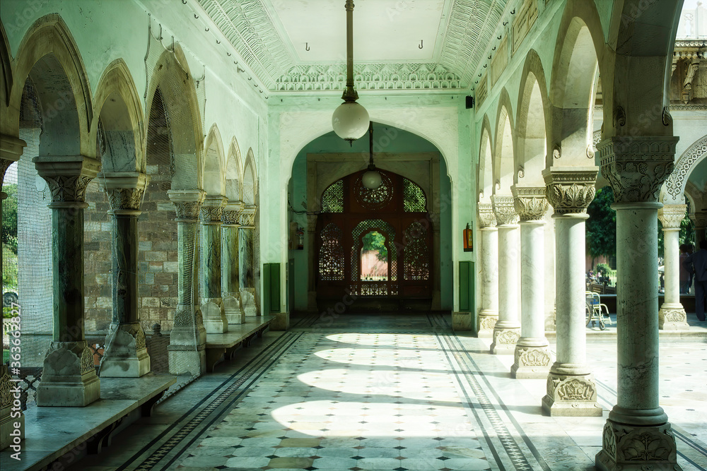 Jaipur, India - October 20, 2012: Interior corridor of Indian architecture with designer pillar captured in an art museum