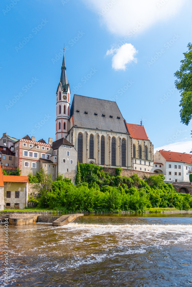 St Vitus church in the middle of historical city centre. View from Vltava River. Cesky Krumlov, Southern Bohemia, Czech Republic