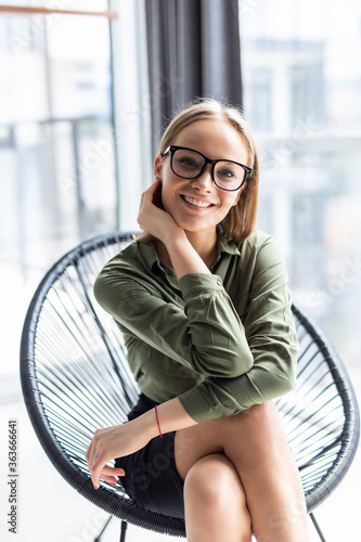 Young woman resting in chair at home © F8  \ Suport Ukraine