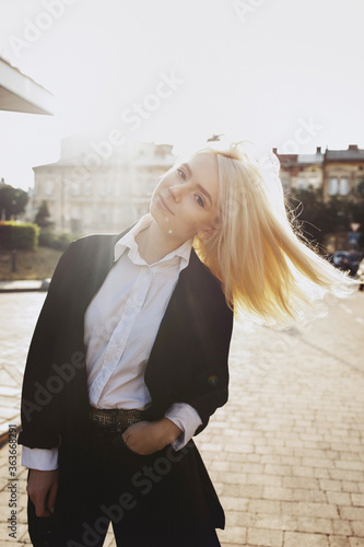 Attractive model posing outdoor during daylight time. photo