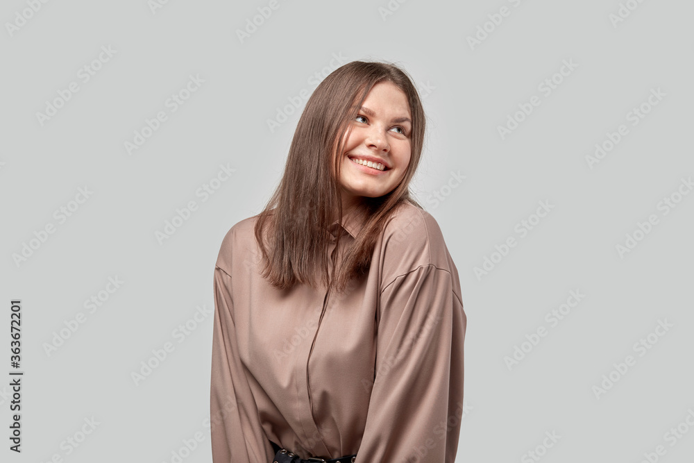 Beautiful brunette girl with a wide smile. Human emotions. Beautiful brunette girl with a wide smile. Human emotions.