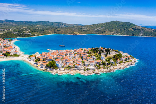 Aerial view of Primosten old town  amazing sunny landscape  Dalmatia  Croatia. Famous tourist resort on Adriatic sea coast.