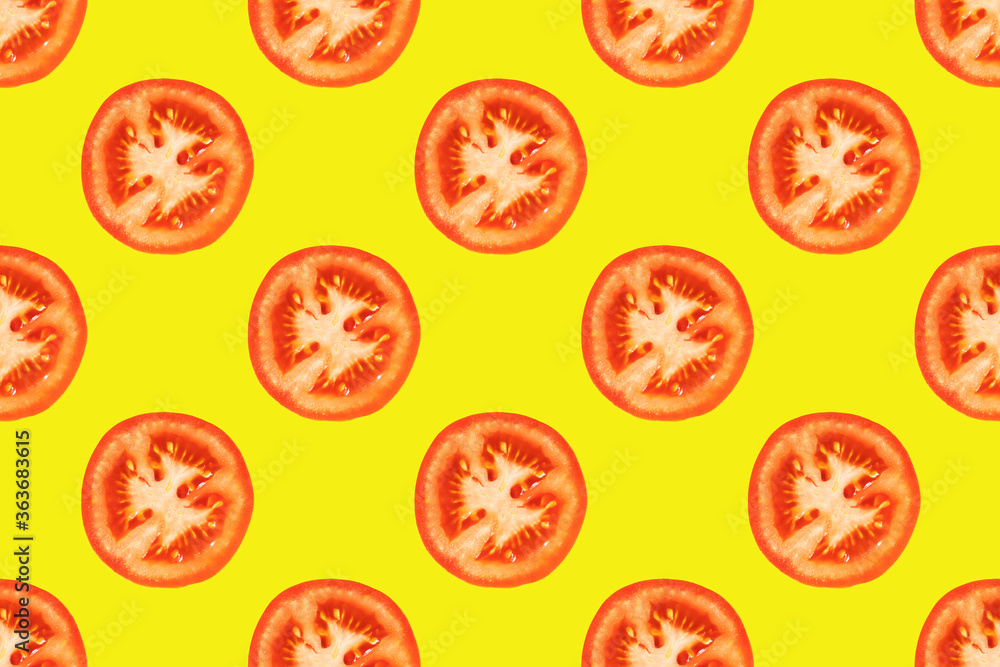 Seamless pattern of tomato slices on a yellow background. A simple drawing for the surface of packaging, textiles, advertising. Seamless pattern of tomato slices on a yellow background. A simple drawing for the surface of packaging, textiles, advertising.