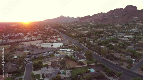 Sun setting over Phoenix Arizona and Camelback Mountain. photo