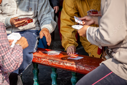 playing cards in park in China