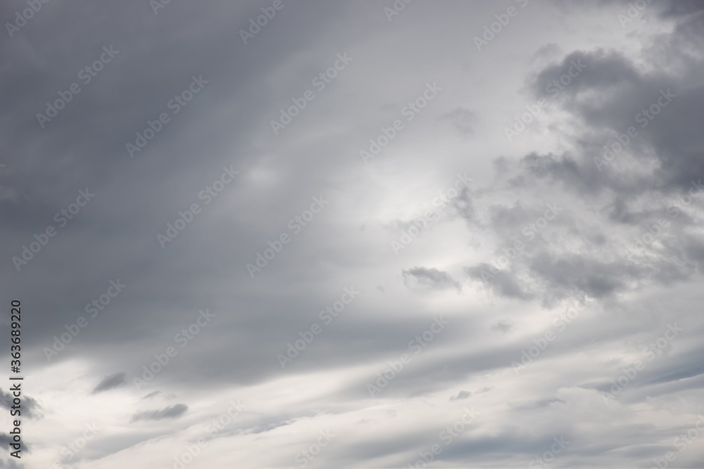 Dramatic gray clouds in the sky. Beautiful cirrocumulus clouds