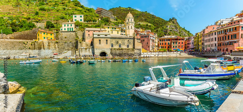 A panorama view across the harbour in the picturesque village of Vernazza in the summertime