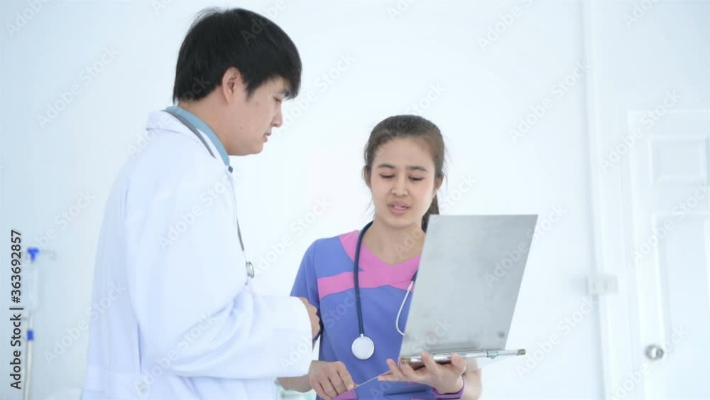 Medical concepts. Doctors and nurses are discussing within the hospital. 4k Resolution. Medical concepts. Doctors and nurses are discussing within the hospital. 4k Resolution.