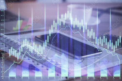 Double exposure of forex chart drawing and cell phone background. Concept of financial data analysis © peshkova