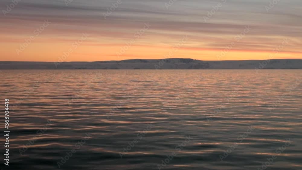 Dramatic Sunset and Sunrise in Antarctica - Antarctic Peninsula - Palmer Archipelago Dramatic Sunset and Sunrise in Antarctica - Antarctic Peninsula - Palmer Archipelago