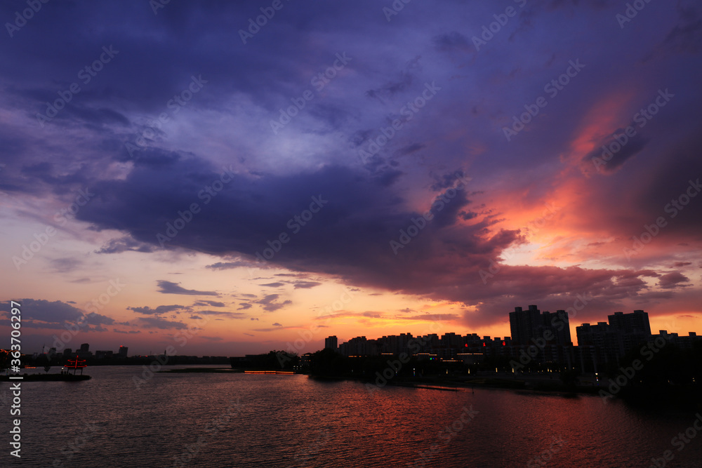 The evening scenery of waterfront city