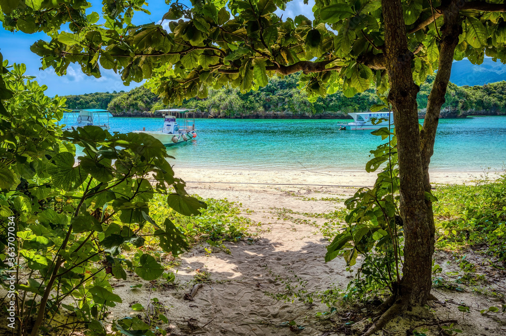 The pristine waters and white of Kabira Bay, Ishigaki Island, Okinawa, Japan The pristine waters and white of Kabira Bay, Ishigaki Island, Okinawa, Japan