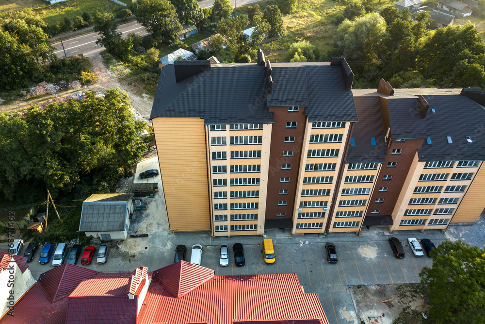 Aerial view of multistory apartment buildings in green residential area. Aerial view of multistory apartment buildings in green residential area.