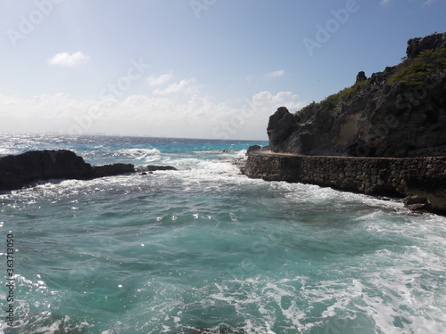 Isla Mujeres South Point Cancun Mexico rocky shore blue water and crashing waves 2020