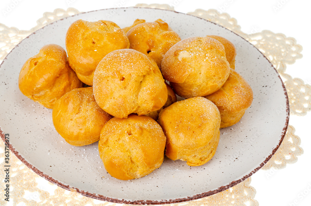 Sweet delicious crunchy homemade profiteroles. Studio Photo Sweet delicious crunchy homemade profiteroles. Studio Photo