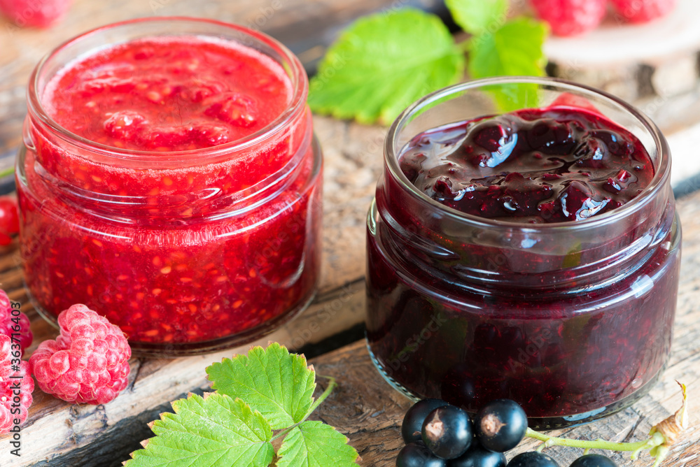 raspberry and currant jam in small jars
