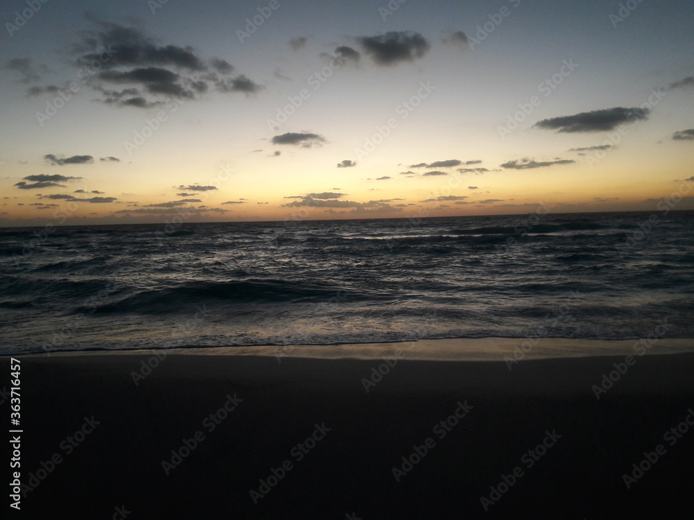 Sunrise over the beach and ocean in Cancun Mexico 2019