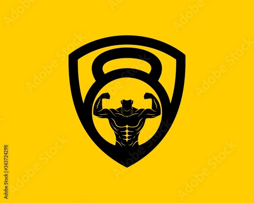 Protection shield with kettle bell and strong man inside