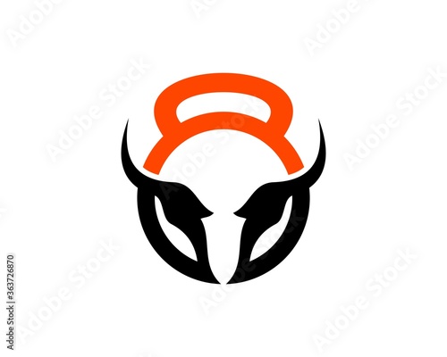 Orange and black kettle bell with bull horn inside