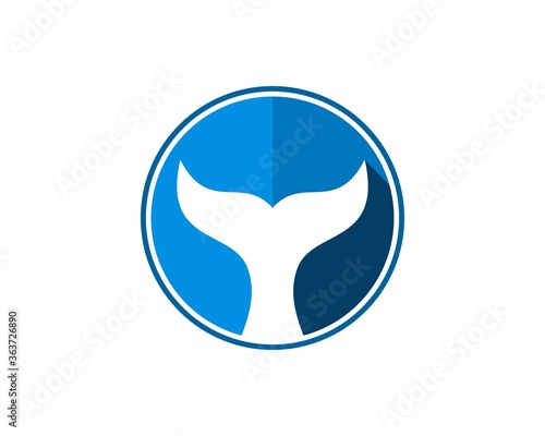 Blue circle shape with tail whale inside