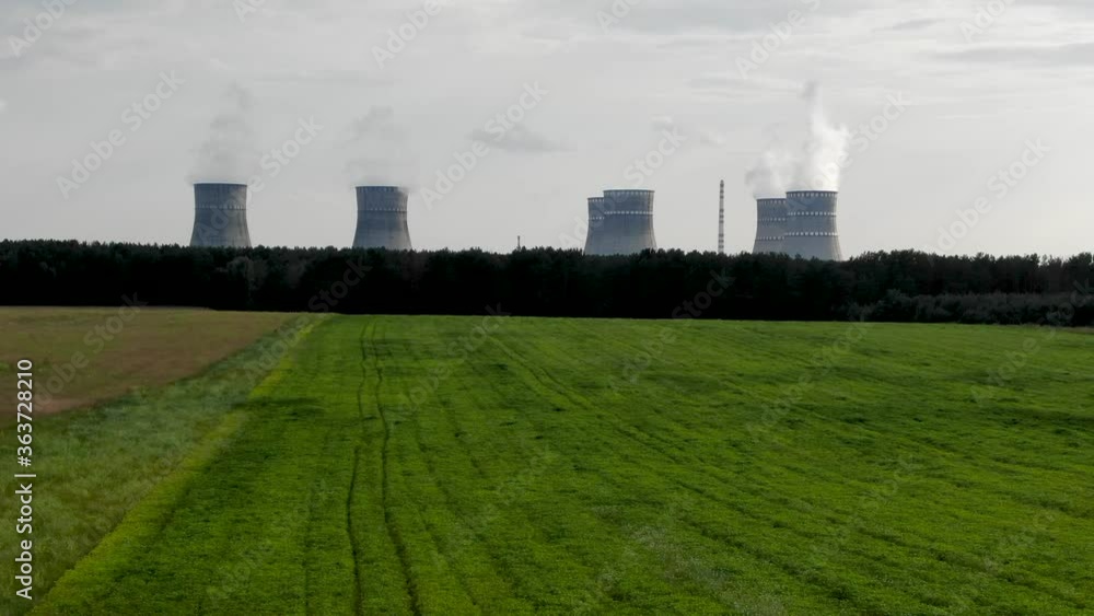 Aerial drone low push-in reveal shot or a nuclear power plant in Ukraine Aerial drone low push-in reveal shot or a nuclear power plant in Ukraine
