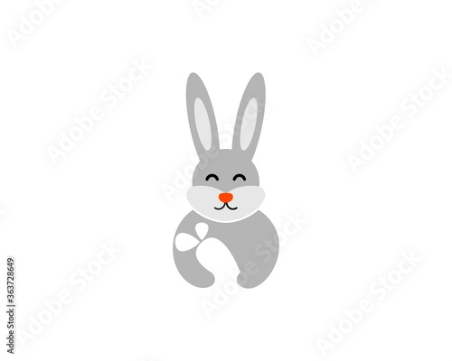 Cute rabbit with carrot in hand