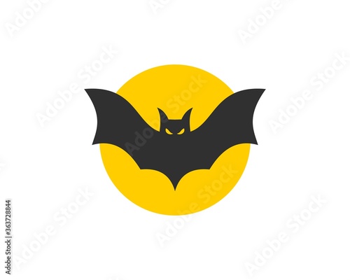 Black bat with moon behind