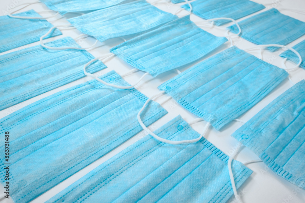 Obraz premium Several light blue ear loop masks