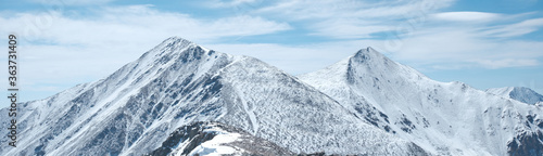 Panorama of Torreys mountain summit in the foreground and Grays mountain summit in the background on the right photo