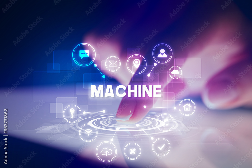 Finger touching tablet with web technology icons and MACHINE inscription, web technology concept Finger touching tablet with web technology icons and MACHINE inscription, web technology concept