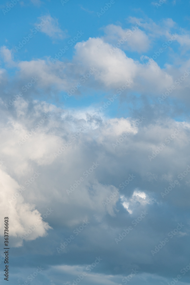 Atmospheric blue sky with gray and white clouds
Atmospheric blue sky with gray and white clouds