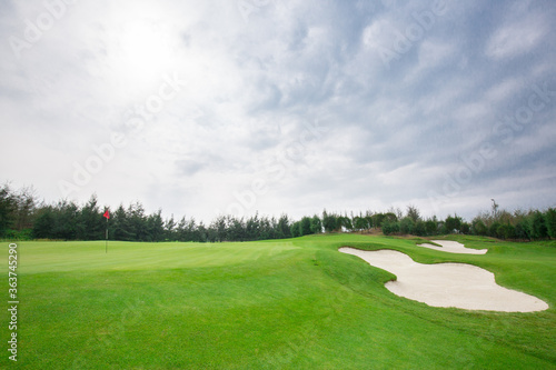 golf course and bunkers with clouds on a gloomy day