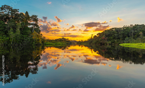 Panorama of a sunset in the Amazon Rainforest which comprise the countries of Brazil, Bolivia, Colombia, Ecuador, Guyana, Peru, Suriname and Venezuela photo