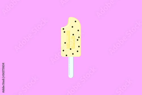 Pineapple ice cream with chocolate sprinkles. Yellow color gives the impression of a strong taste and aroma