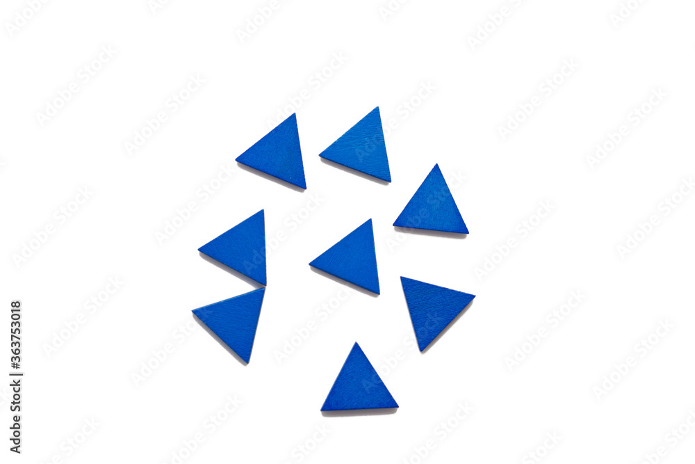 Blue wood triangles randomly arranged on a white isolated background Blue wood triangles randomly arranged on a white isolated background