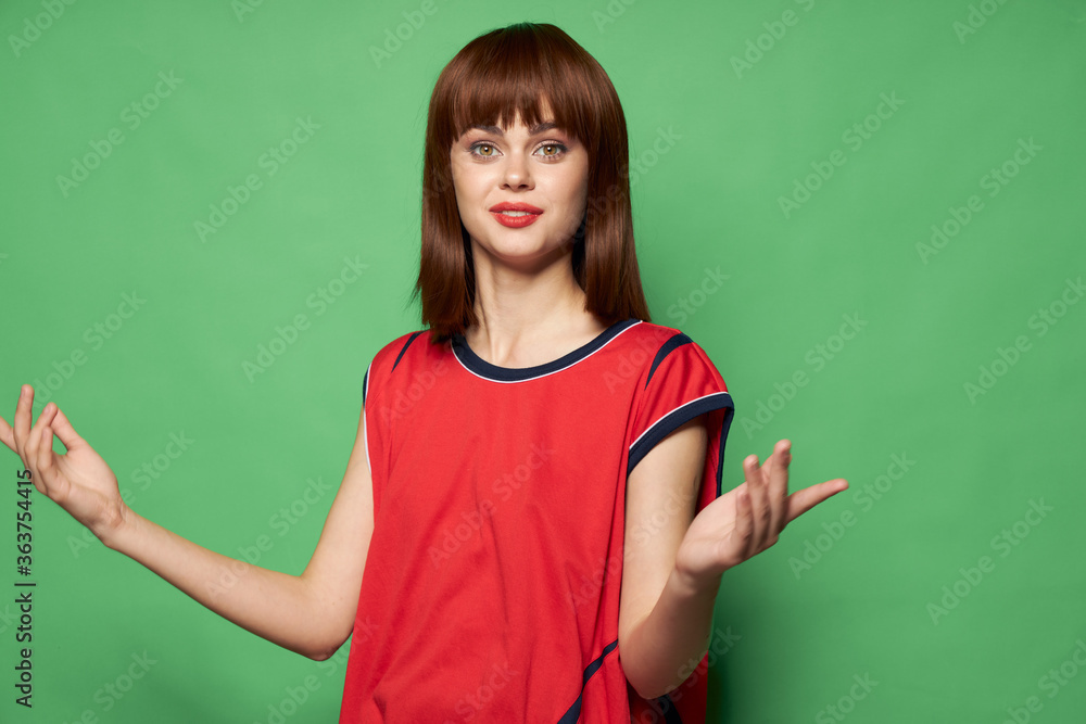 woman spreads her arms to the sides and looks at the camera cheerfully woman spreads her arms to the sides and looks at the camera cheerfully
