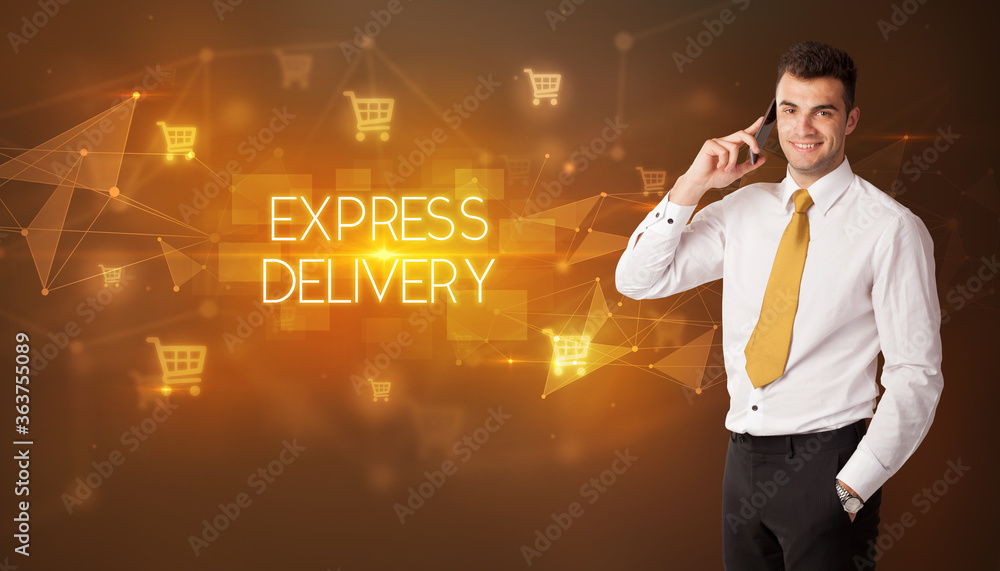 Businessman with shopping cart icons and EXPRESS DELIVERY inscription, online shopping concept Businessman with shopping cart icons and EXPRESS DELIVERY inscription, online shopping concept
