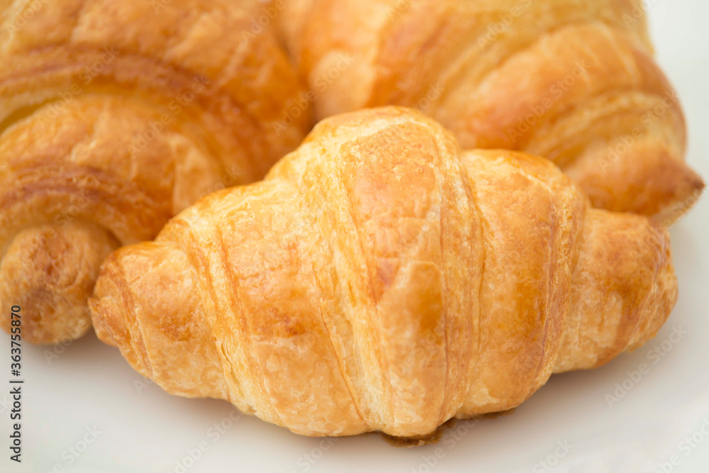 Close up of Croissant Isolated White Background.