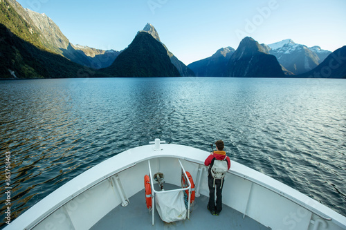 Traveller with beautiful scenic of milford sound in fiordland national park new zealand.
