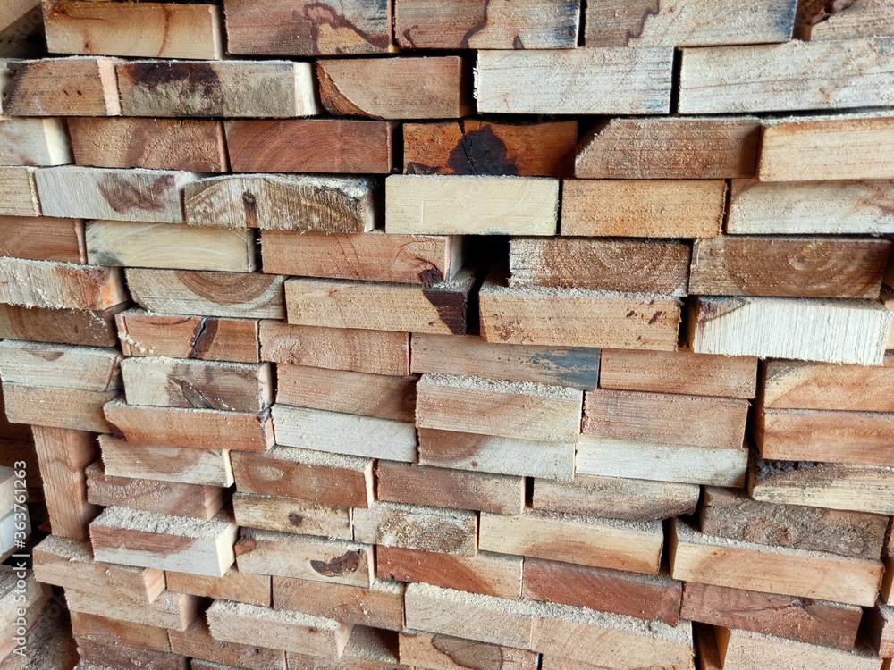 Fototapeta premium Wood planks in sawmil for construction material