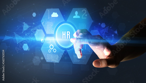 Hand touching HR inscription, new technology concept