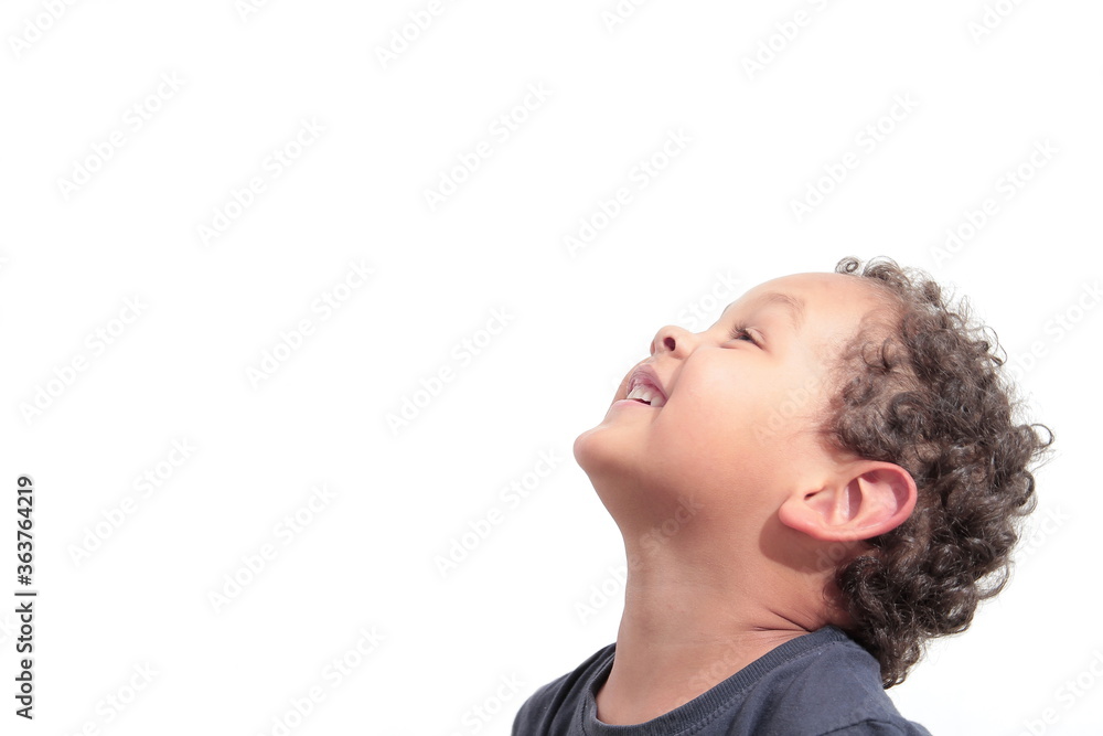 Fototapeta premium boy looking up to the sky stock photo