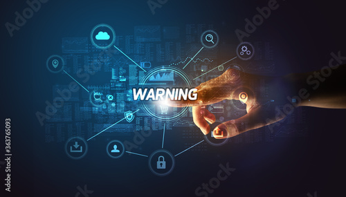 Hand touching WARNING inscription, Cybersecurity concept