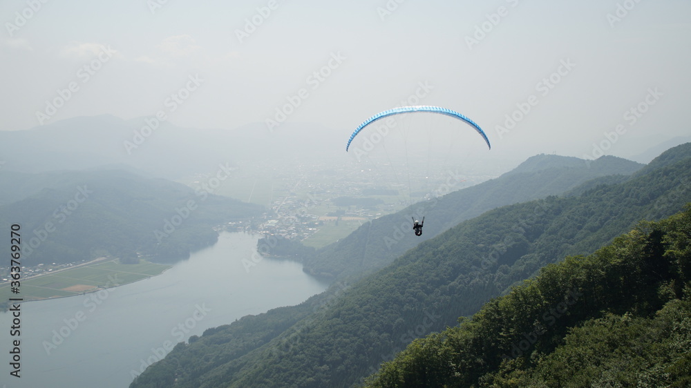 Fly over the lake Kizaki with a paraglider Fly over the lake Kizaki with a paraglider